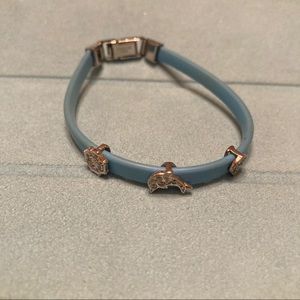 Blue rubber bracelet with silver charms